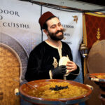 bab-cuisine-moroccan-street-food-booth-traditional-attire-berlin